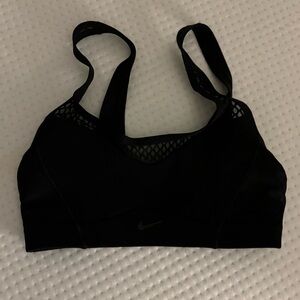Black open back Nike sports bra